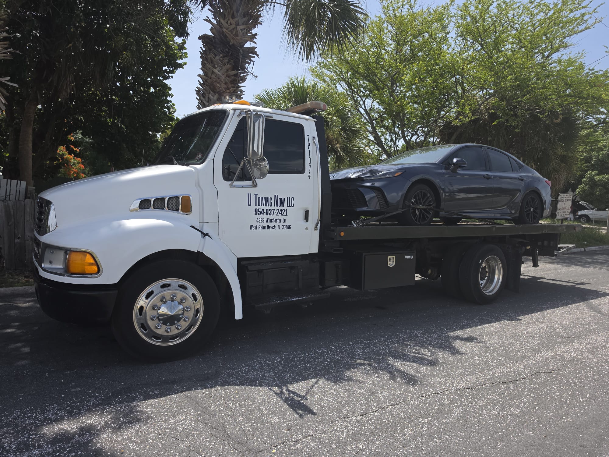Tow truck assisting a vehicle